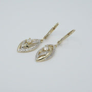 cr-e51822-10k-2-tone-0-14-ctw-canadian-diamond-earrings-fame-diamonds
