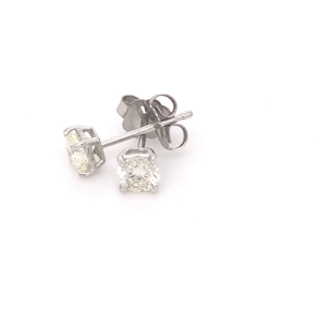 14k .50ctw diamond stud earrings