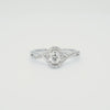 canadian-diamond-oval-halo-twist-split-shank-14k- white-gold-diamond-engagement-ring