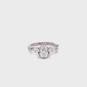     fancy-solitaire-twist-band-diamond-engagement-ring-lab-grown-tear-drop-matching-wedding-band-fame-diamomds