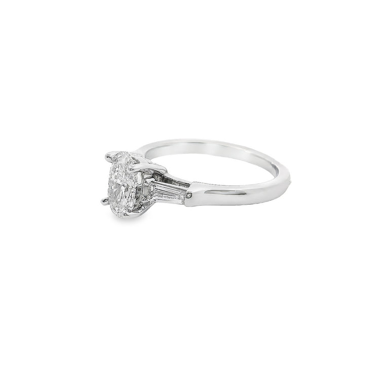 1-ct-oval-lab-diamond-three-stone-baguette-side-engagement-ring-white-gold-Fame-Diamonds