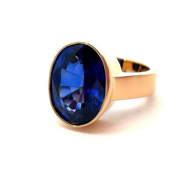 Over 11 ct Oval Blue Sapphire ring in a bezel set