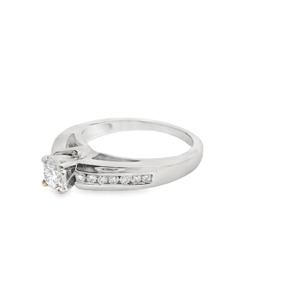 0.63ctw 14K white gold Canadian solitaire accented with channel set diamond engagement ring - angle view