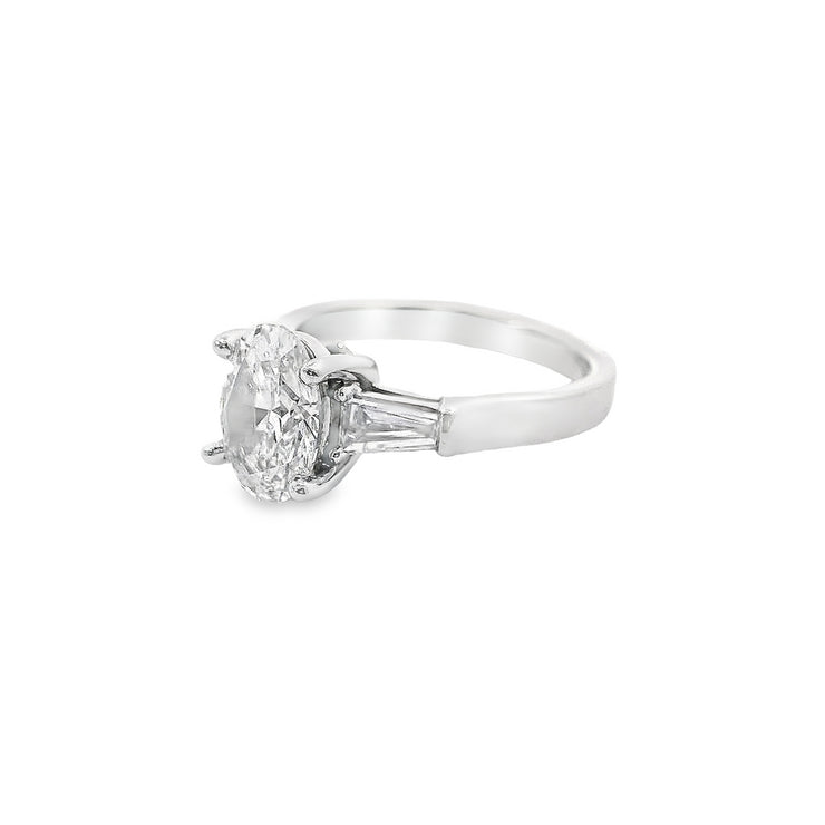  Analyzing image     2-ct-oval-lab-diamond-engagement-ring-three-stone-white-gold-Fame-Diamonds