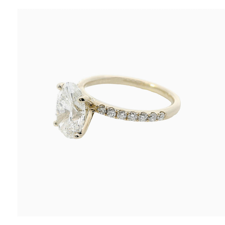  Analyzing image      2.ct-oval-lab-diamond-modern-solitaire-side-diamond-engagement-ring-yellow-gold-fame-diamonds