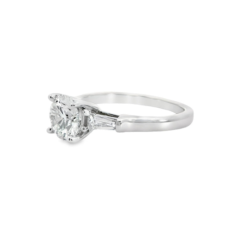 over-1-ct-round-brilliant-cut-lab-diamond-with-taperred-baguttes-three-stone-engagment-ring