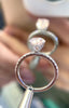 fancy-hidden-halo-pink-diamond-engagement-ring-Fame-Diamonds-Vancouver
