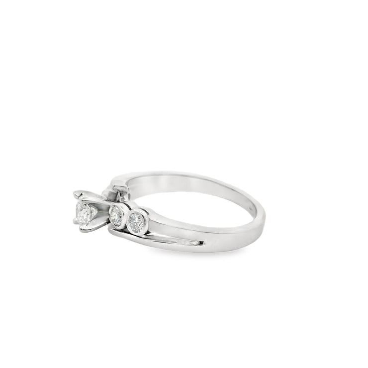solitaire-bezel-set-side-diamonds-canadian-diamond-engagement-gold-jewelry-store-vancouver-fame-diamonds
