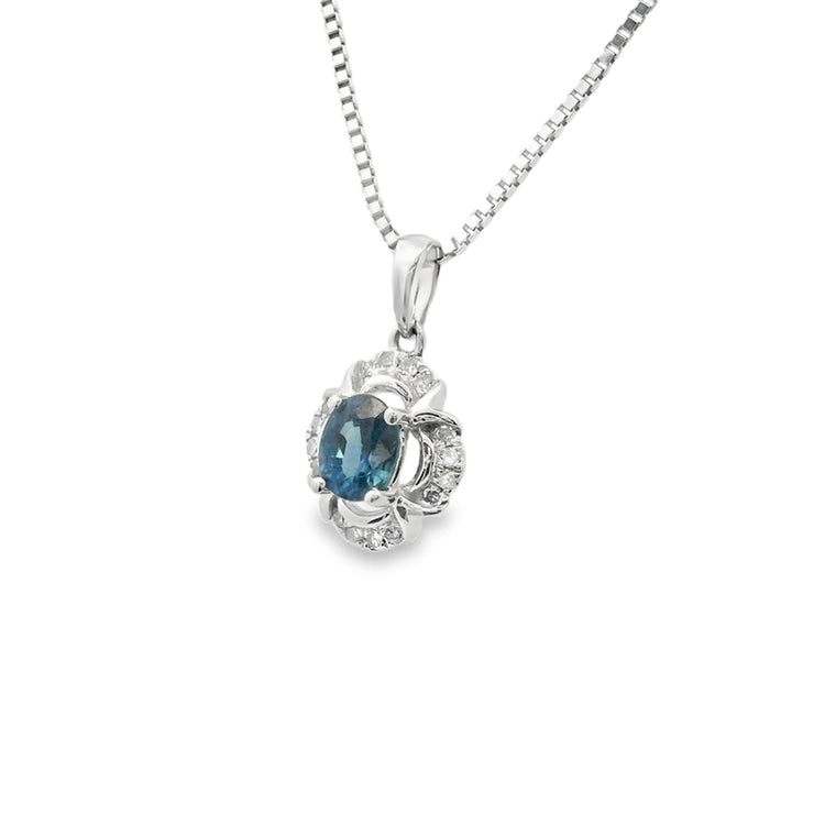 vintage-halo-natural-blue-sapphire-and-diamond-pendant-jewelry-store-Vancouver-Fame-Diamonds