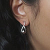 cr-e127458-10k-gold-0-2-ctw-infinity-diamond-stud-earrings