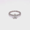 18k-white-gold-pear-shape-solitaire-side-diamond-engagement-ring-fame-diamonds