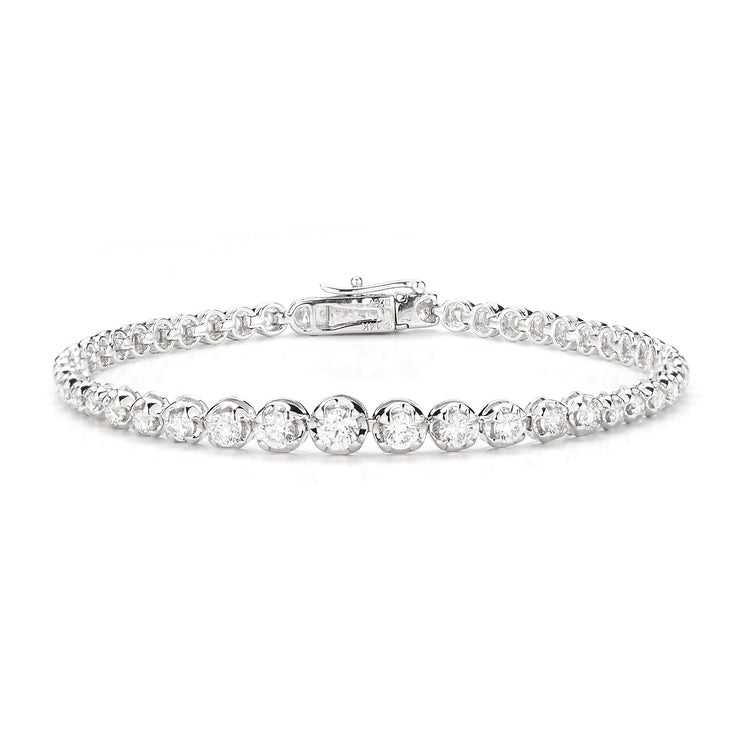 Graduated Solitaire Bracelet Made In 14K White Gold