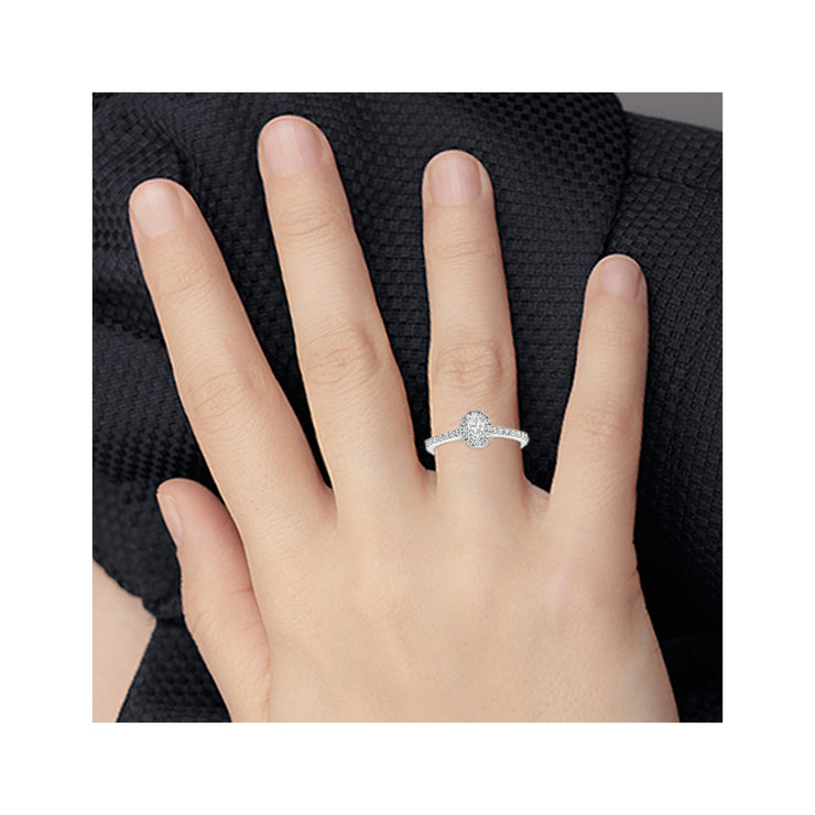 0.55 ctw Oval Halo Side-Diamond Engagement Ring