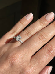 Modern Oval Solitaire Pave-Set Side-Diamond Engagement Ring