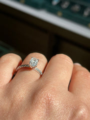 Modern Oval Solitaire Pave-Set Side-Diamond Engagement Ring