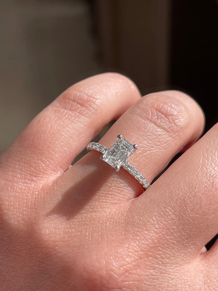 Modern Emerald Cut Solitaire Side-Diamond Engagement Ring