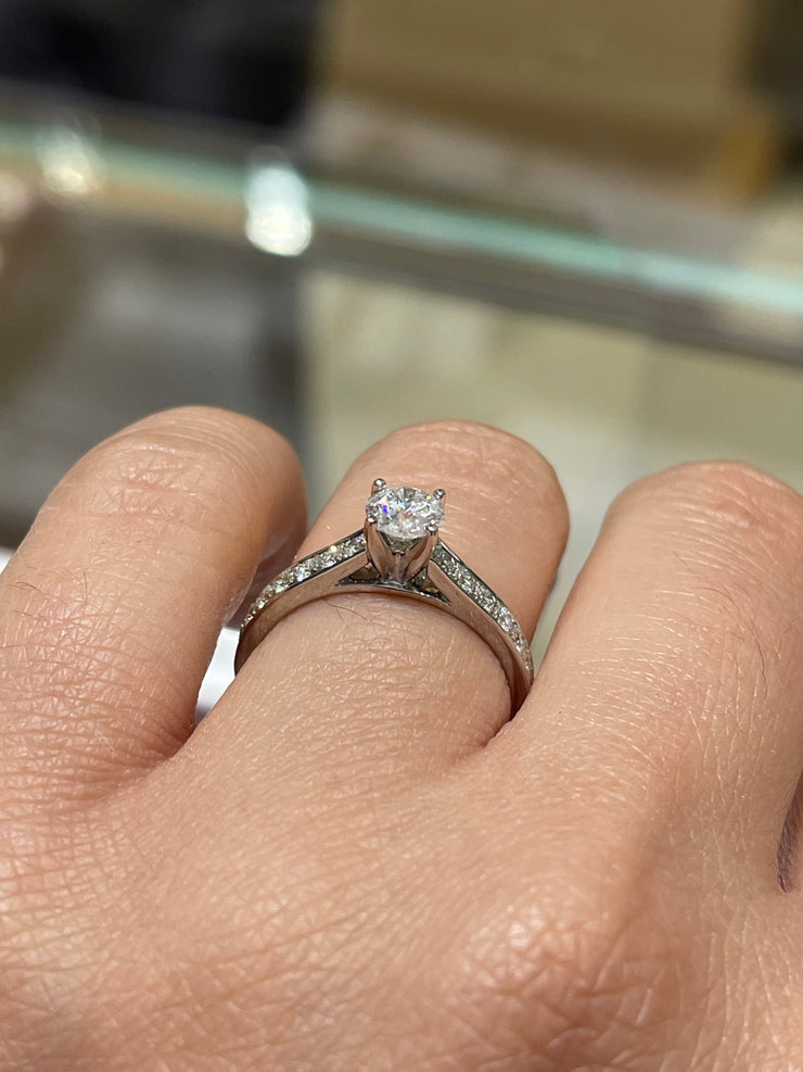 4-Prong Solitaire Channel-Set Side-Stone Diamond Engagement Ring