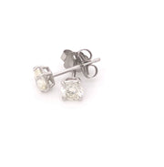 14k .50ctw diamond stud earrings
