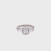     fancy-solitaire-twist-band-diamond-engagement-ring-lab-grown-tear-drop-matching-wedding-band-fame-diamomds