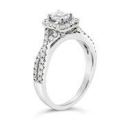 emerald-halo-twist-diamond-shank-engagement-ring-fame-diamonds