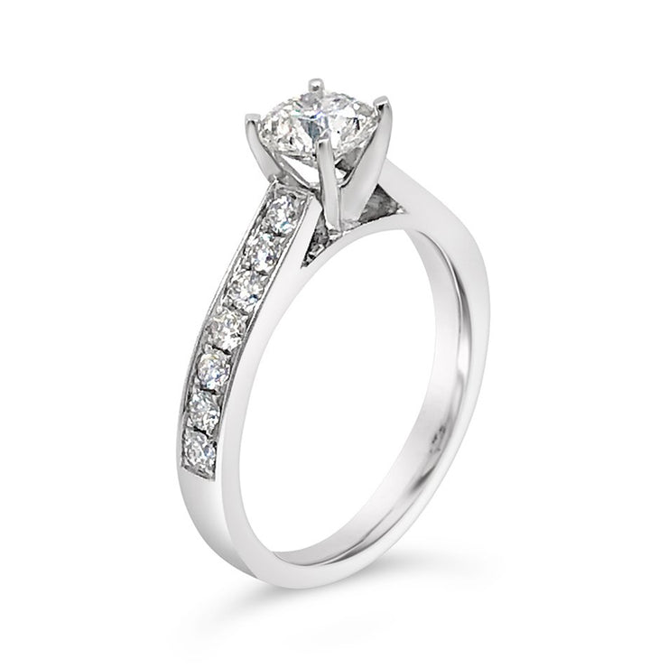 4-Prong Solitaire Channel-Set Side-Stone Diamond Engagement Ring