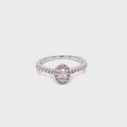 white-gold-oval-halo-side-diamond-engagement-ring-fame-diamonds