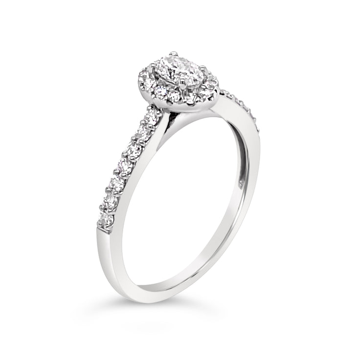 oval-halo-side-diamond-engagement-ring-fame-diamonds
